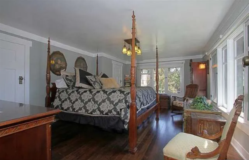 Gallery of six photographs showing the upstairs spaces of the Josephine van Rossem House No. 2 (1904) by Greene & Greene, including bathroom, four bedrooms with period furnishings and distinctive color schemes, and upstairs hallway with wood trim and built-in features, demonstrating the California House concept's comprehensive interior planning in Pasadena, California.