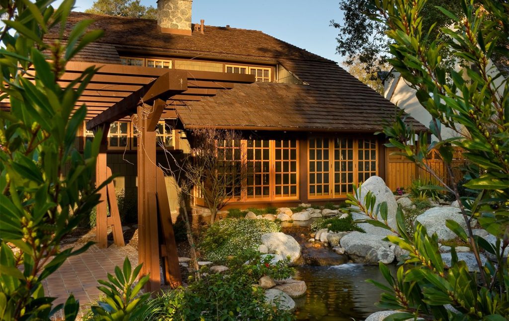 Garden pond feature of Mary L. Darling House showing landscape design integration with water elements and natural materials by Greene & Greene, 1903.