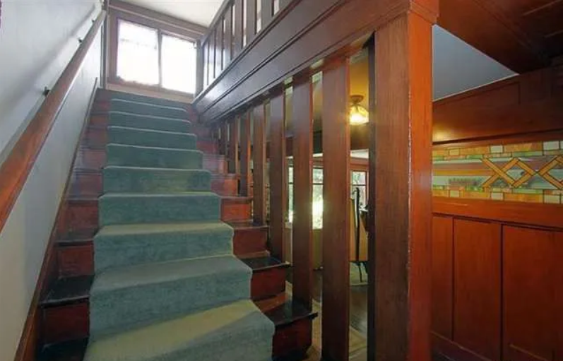 Gallery of six interior photographs showing the Josephine van Rossem House No. 2 (1904) by Greene & Greene, including dining room, fireplace area, kitchen, living room, stairway, and sun room, demonstrating the California House concept's interior planning, authentic woodwork, and indoor-outdoor living integration in Pasadena, California.