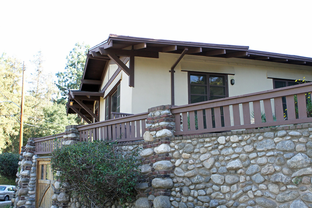 Contemporary view of Martha, Violet and Jane White House showing preserved Arts and Crafts design with boulder foundations, timber work, and horizontal Craftsman elements by Greene & Greene, 1903.