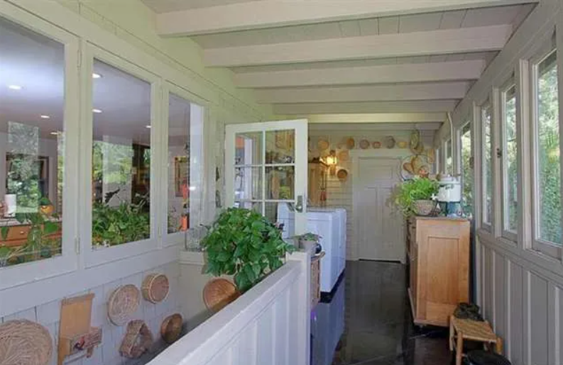 Gallery of six interior photographs showing the Josephine van Rossem House No. 2 (1904) by Greene & Greene, including dining room, fireplace area, kitchen, living room, stairway, and sun room, demonstrating the California House concept's interior planning, authentic woodwork, and indoor-outdoor living integration in Pasadena, California.