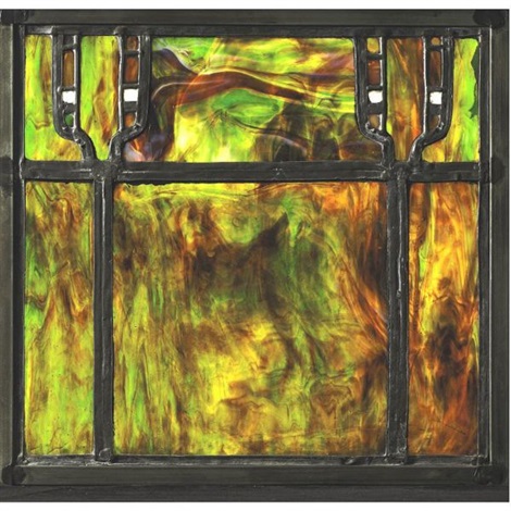 A close-up photograph of an art glass window from the Judge Charles J. Willett House, featuring intricate leading and colorful glass.