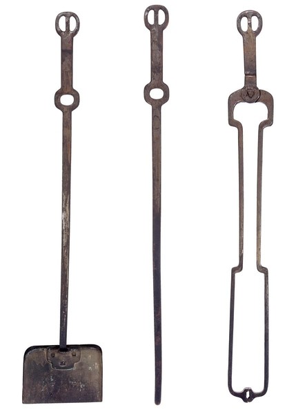 Wrought iron fireplace tool set with custom stand, featuring elegant utility and handcrafted details. The tools demonstrate Arts and Crafts ideal of beauty in everyday objects, with simple forms, quality materials, and design consistency with other fireplace accessories.