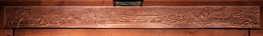 Complex frieze composition integrating multiple natural elements including trees, ocean waves, birds, and branches. The panoramic scene demonstrates the transition from land to sea, painted in harmonious earth and water tones characteristic of California landscape.