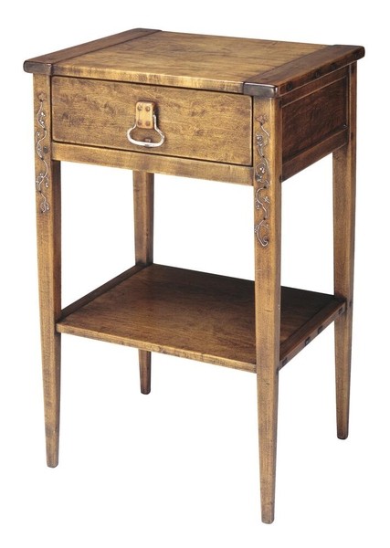 Greene and Greene designed nightstand from the Gamble House crafted by Peter Hall Manufacturing Company in Honduras mahogany and bird's-eye maple, featuring a single drawer with figured maple drawer front and cloud-lift copper pull with decorative escutcheon, lower shelf for storage, front legs decorated with silver and abalone shell inlay depicting stylized vine motifs running vertically down the tapered legs, square ebony pegs throughout, and the characteristic rounded edges and meticulous craftsmanship