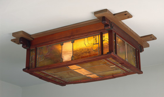 Modern color photograph of the custom-designed ceiling light fixture in the living room of the Freeman A. Ford House.