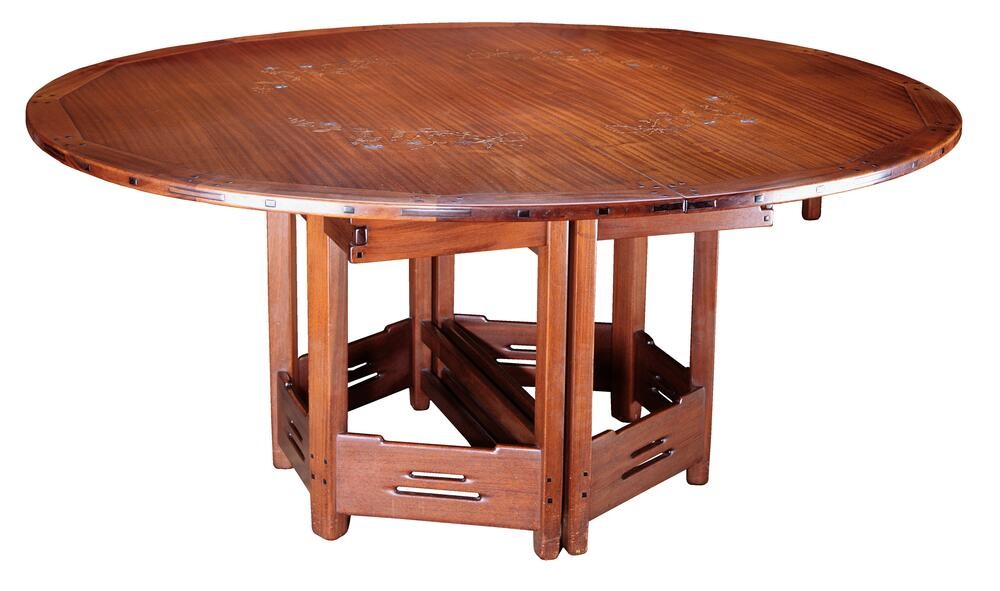 Greene & Greene round dining table for Thorsen House with inlaid top, cloud lift cutouts, and structural base design