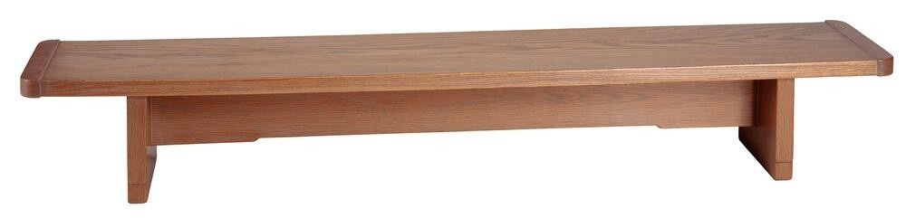 Greene & Greene fire bench for Thorsen House jolly room with simple lines, curved edges, and Arts & Crafts design