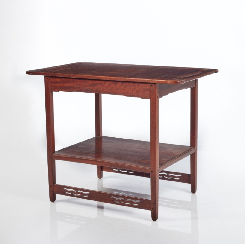 Arts and Crafts serving table with two-tier design, lower shelf with decorative cutouts, and visible pegged joinery.