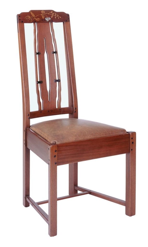 Greene & Greene side chair for Thorsen House with inlaid back splat, vertical slats, leather seat, and ebony pegs