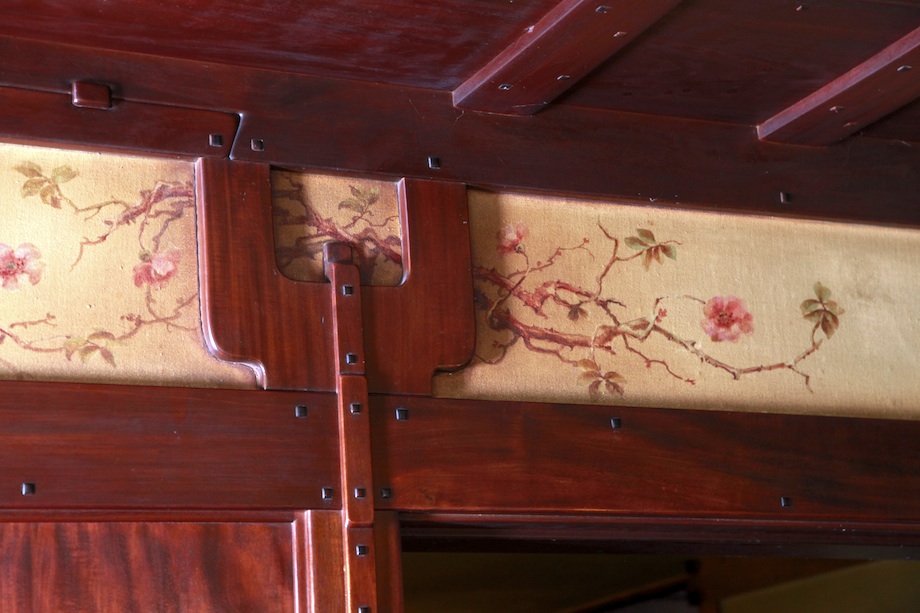 Alternate view of Charles Greene painted frieze at Thorsen House with trailing roses, blossoms, and mahogany woodwork