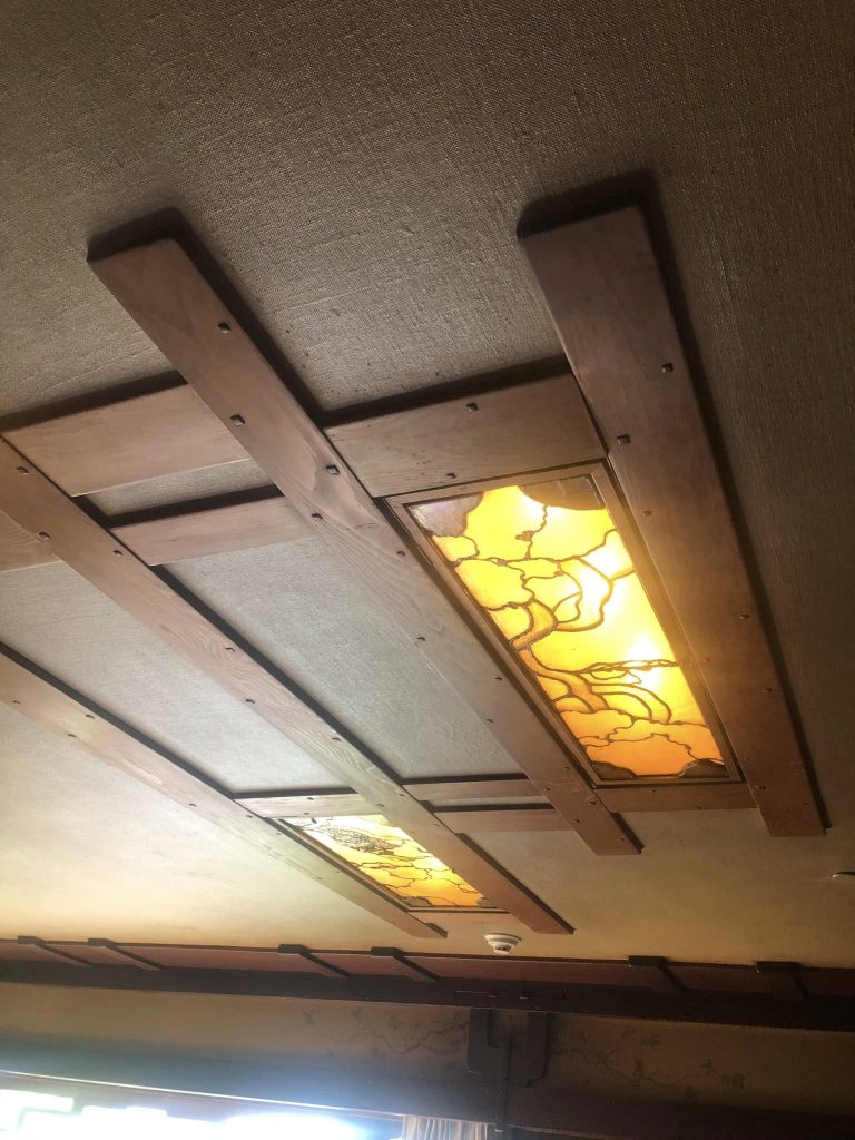 Thorsen House living room recessed ceiling fixtures with cloud lift art glass panels, insisted upon by William Thorsen