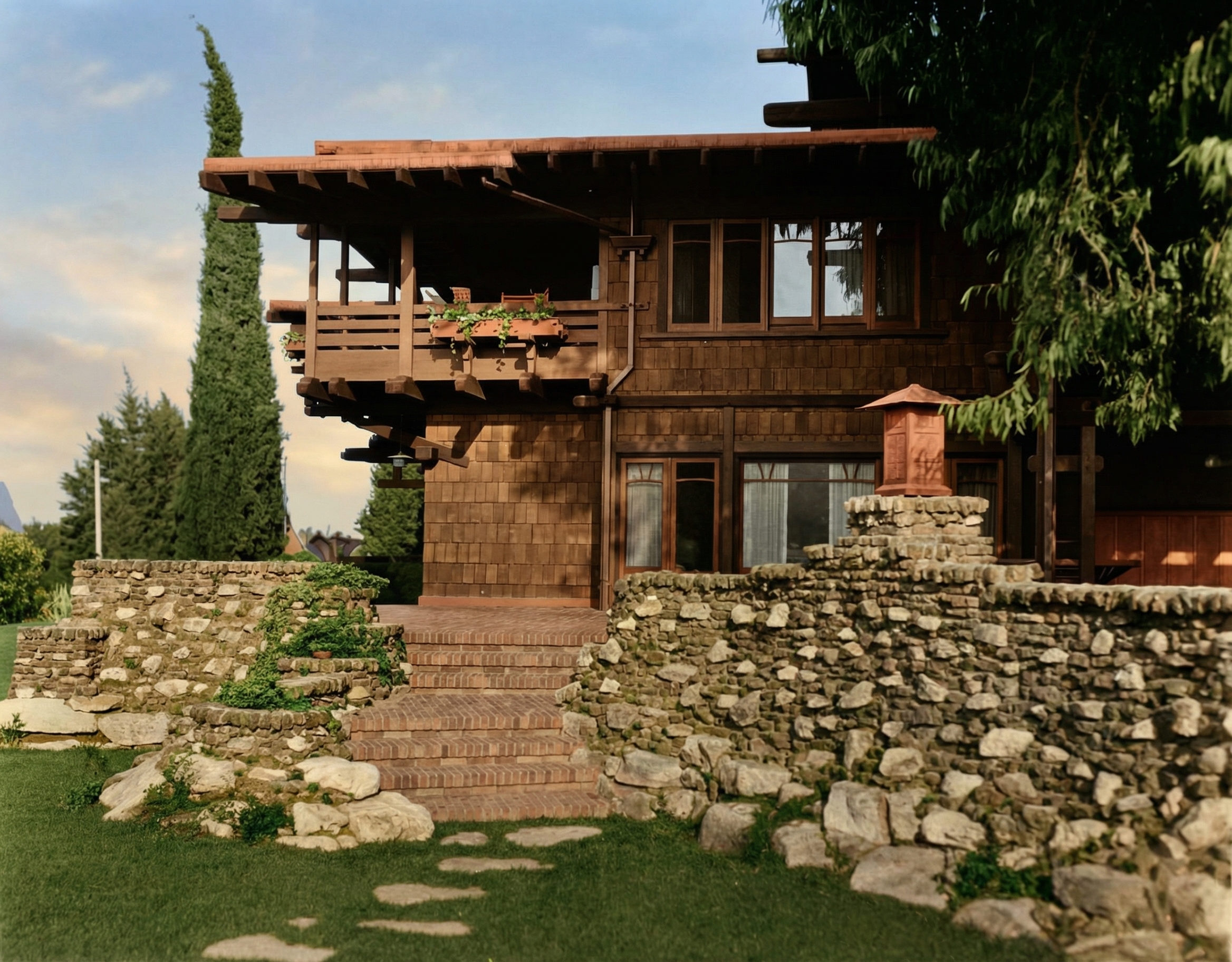 Historic colorized photograph from circa 1908-1910 showing the rear elevation of the newly completed Gamble House.