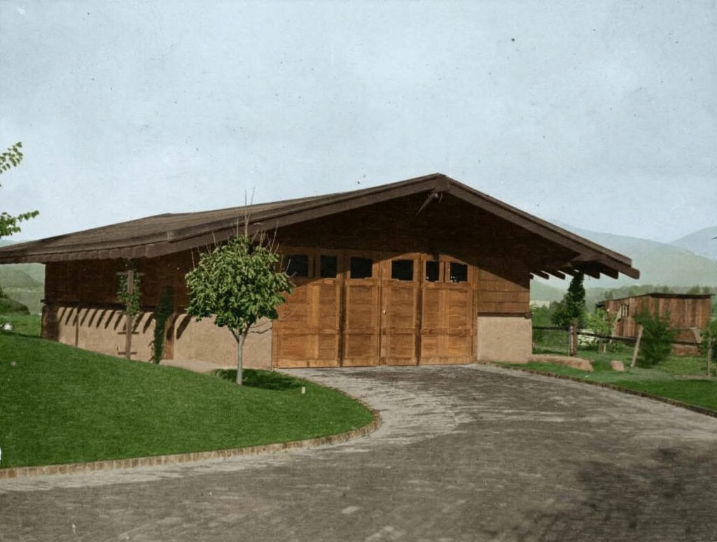 Historic black and white photograph from circa 1908-1910 showing the newly completed Gamble House garage.