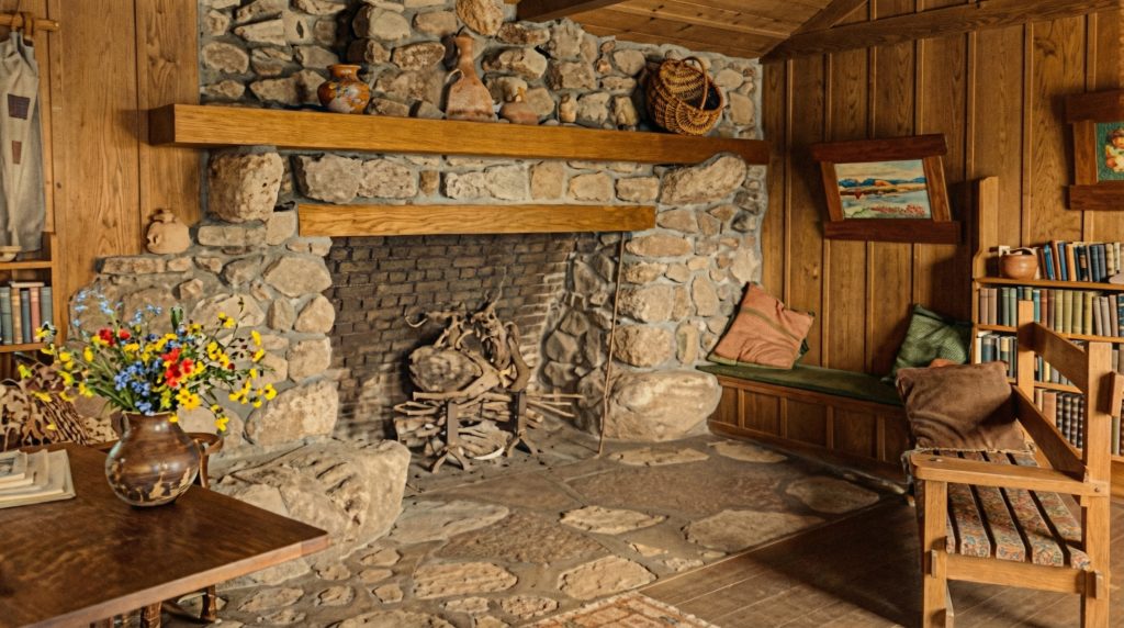 Historic colorized photograph of living room with massive stone fireplace, built-in bookcases, and Arts and Crafts details