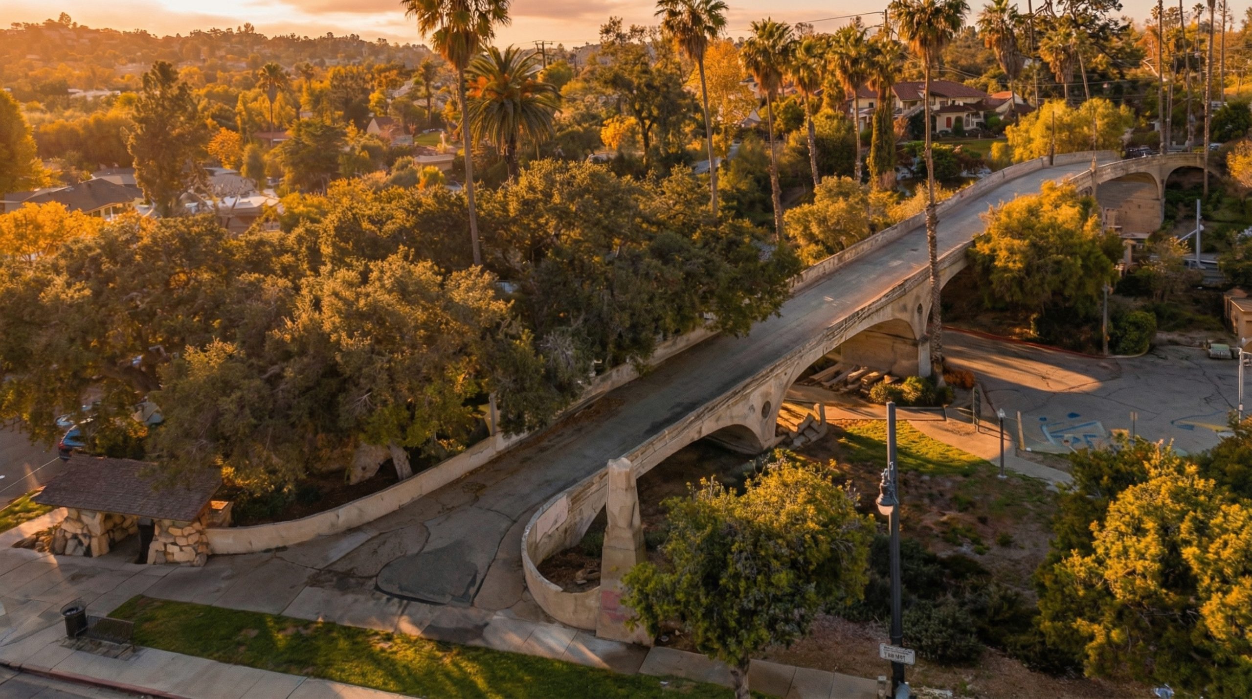 Aerial photograph of the Oaklawn Bridge and surrounding subdivision, showing the bridge's relationship to the street and the railroad corridor