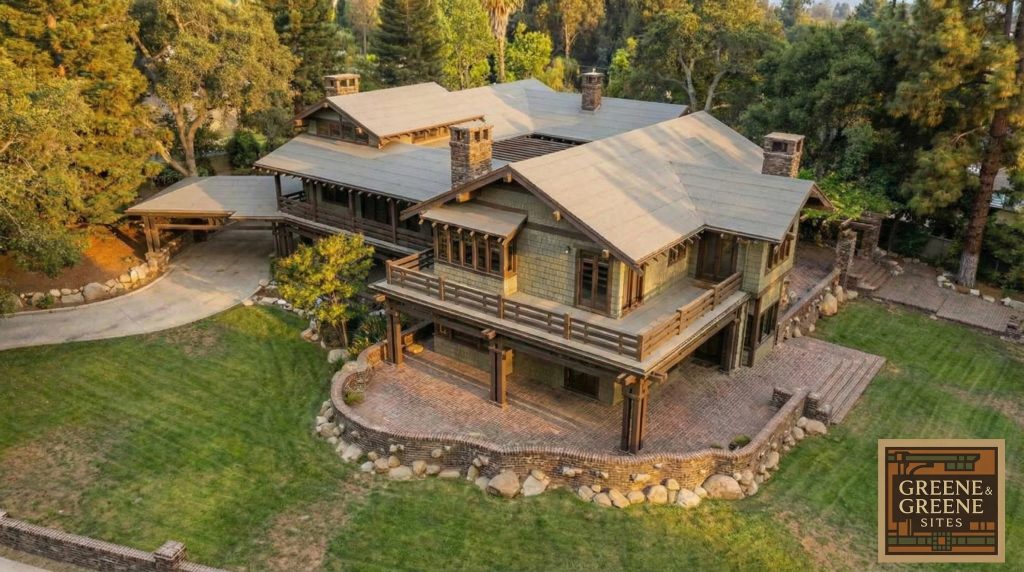 Golden hour aerial rendering of The Duncan-Irwin House corner, highlighting its complex rooflines and terraces.