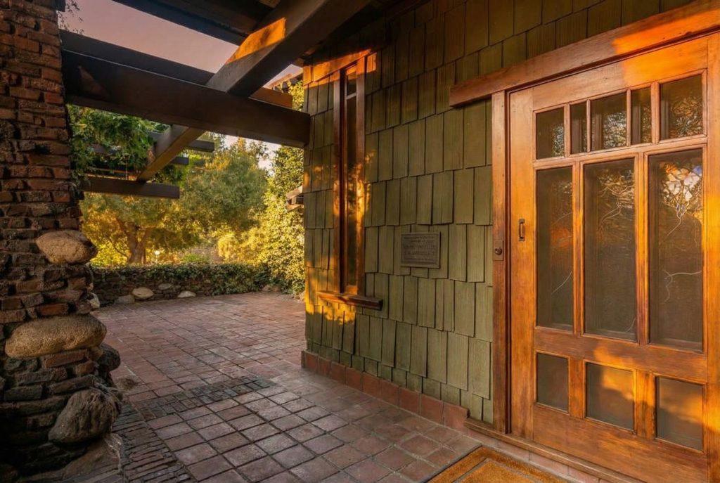Alternate view of The Duncan-Irwin House front door with Emil Lange art glass and wisteria motif.