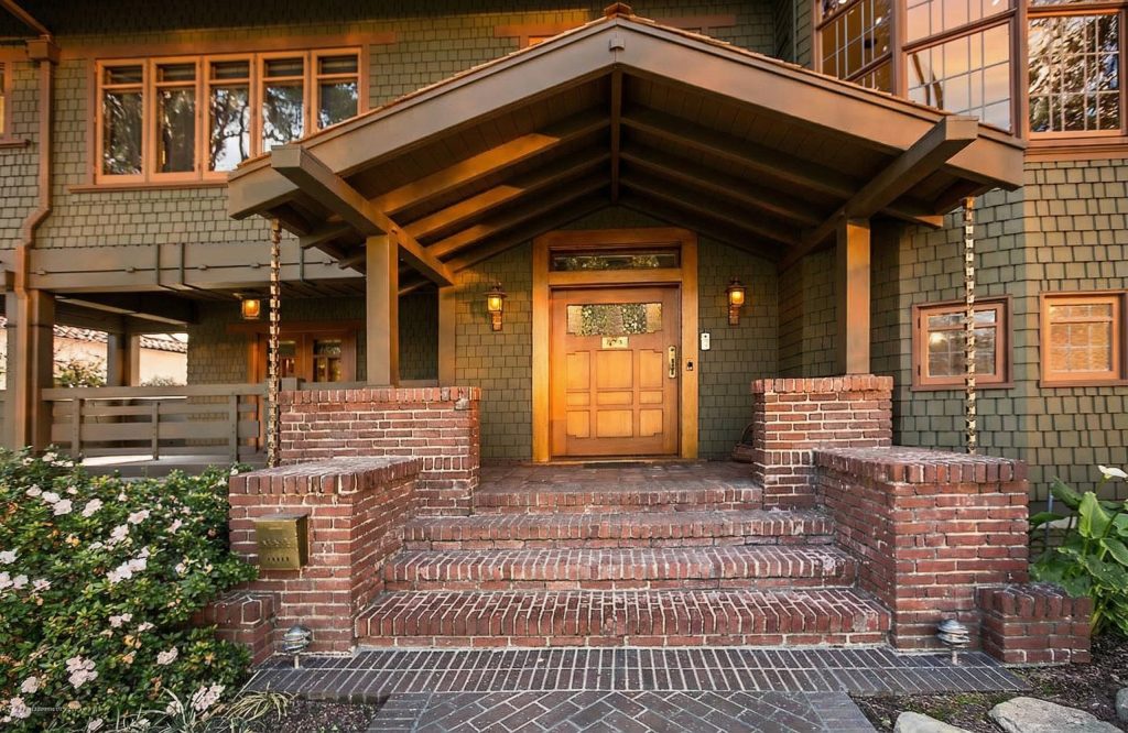 Front entrance of The Dr. William T. Bolton House #3 featuring the distinctive Arts and Crafts entry design.