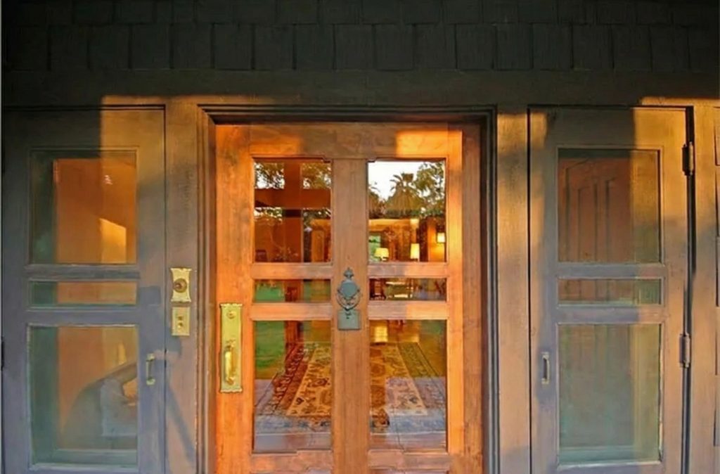 Front door detail with Arts and Crafts hardware at The Margaret B. S. Clapham Spinks House by Greene & Greene.