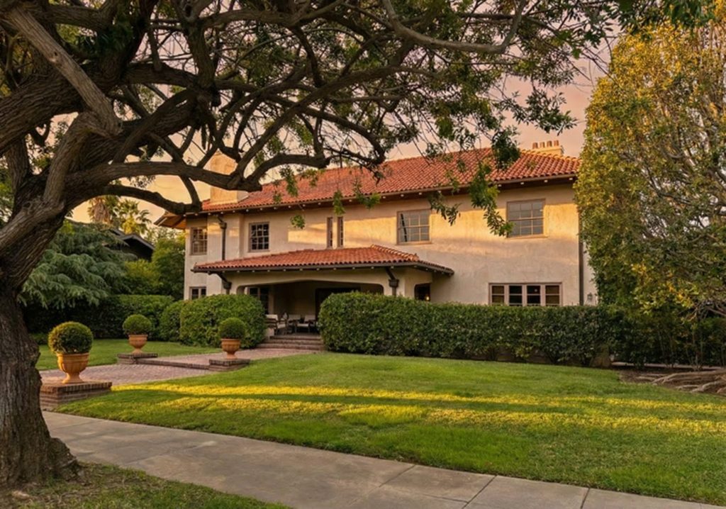 Front perspective view of The Judge Joseph H. Pryor House showing Mission Revival architecture and landscaping.
