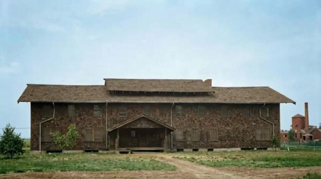 Historic photograph showing full front exterior view of The Charles W. Leffingwell Bunkhouse