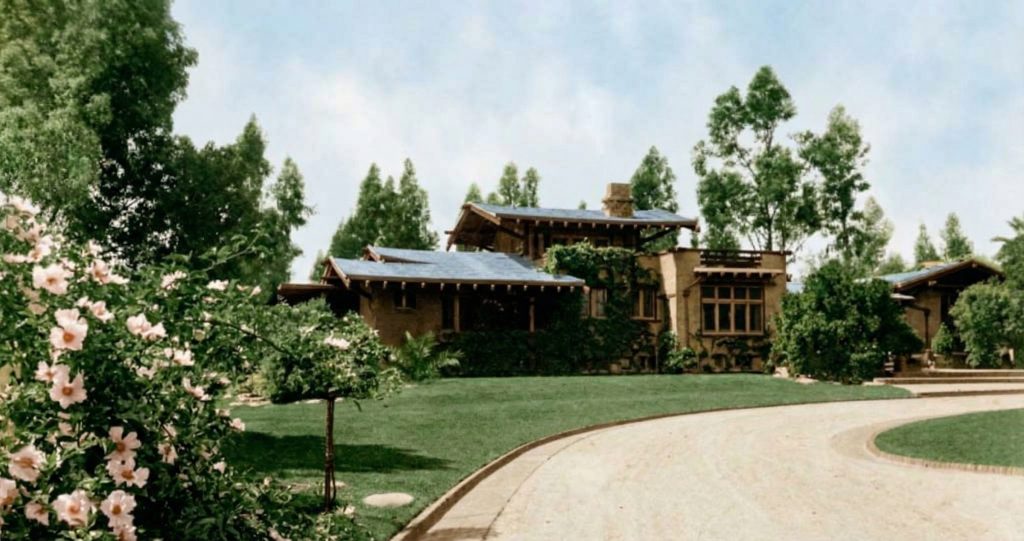Historic colorized photograph of the east facade of the Freeman A. Ford House from the driveway.