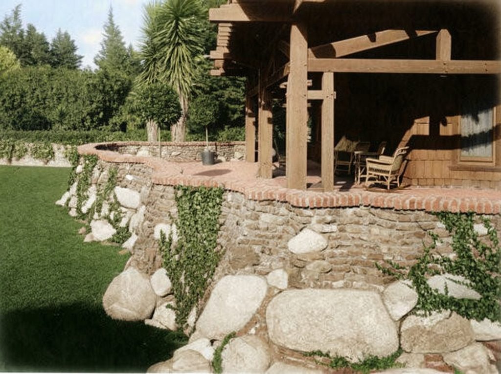 Historic photograph of The Duncan-Irwin House terrace with original furnishings and family.