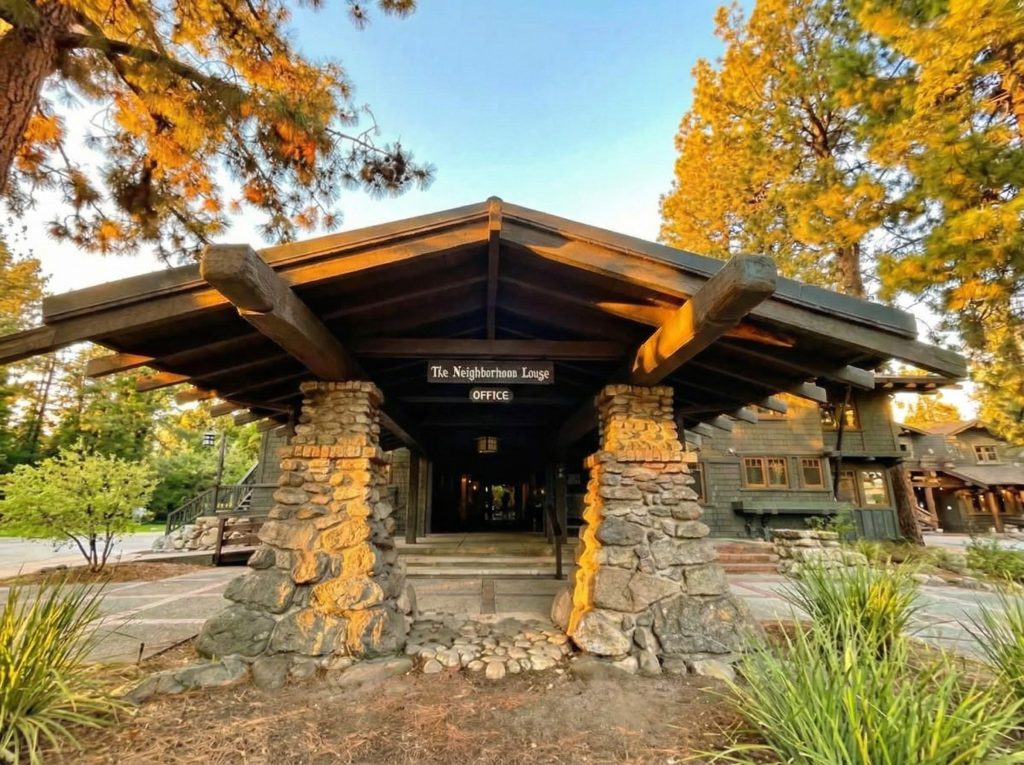 Expanded view of the porte-cochere entrance at The Mary E. Cole House with rustic stone pillars