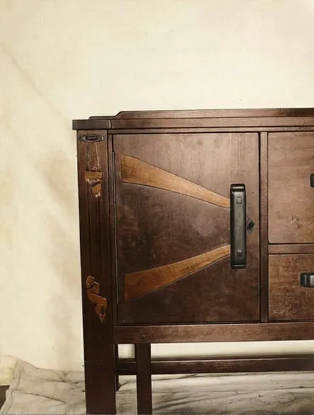 Detail of sideboard door with decorative inlay from the Mrs. Belle Barlow Bush furniture by Greene & Greene