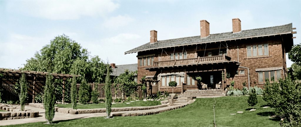 Historic colorized photograph of the backyard at The Dr. William T. Bolton House #3 from the early 20th century.
