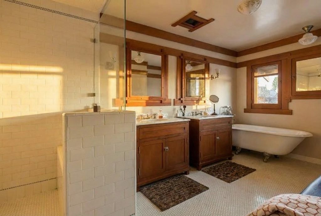 Period-style bathroom with Arts and Crafts tilework at The Margaret B. S. Clapham Spinks House in Pasadena.