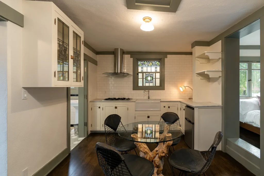 The Duncan-Irwin House guest house kitchen with modern amenities and historic architectural character.