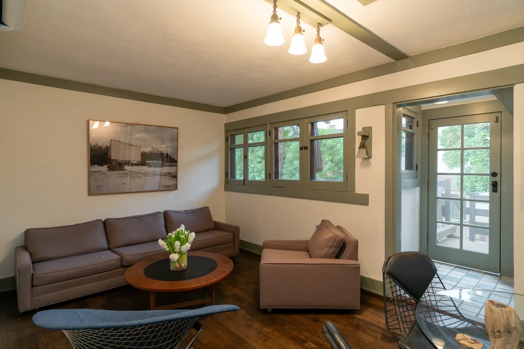 Guest house living room of The Duncan-Irwin House featuring craftsman details and cozy ambiance.