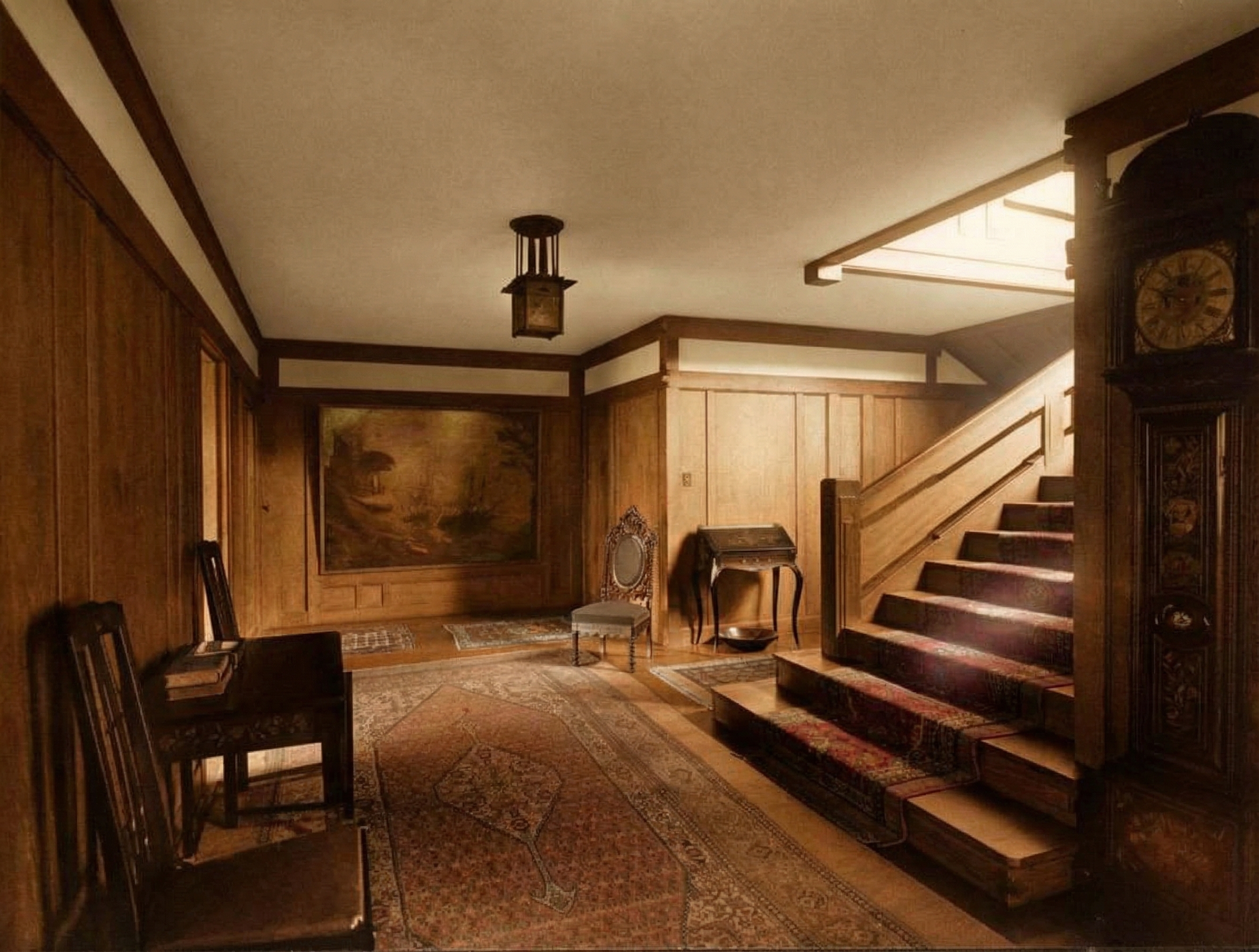 The Thorsen House entrance hall and staircase, paneled in mahogany with the firm's characteristic joinery and a leaded-glass lantern.