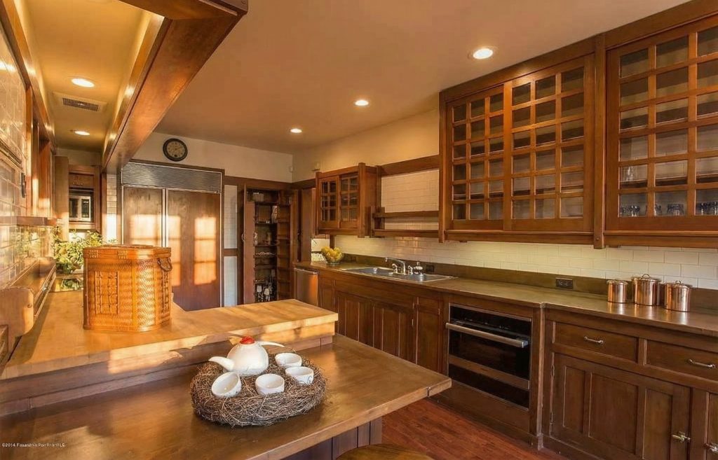 Detailed alternate view of the kitchen at The Dr. William T. Bolton House #3 highlighting custom cabinetry.