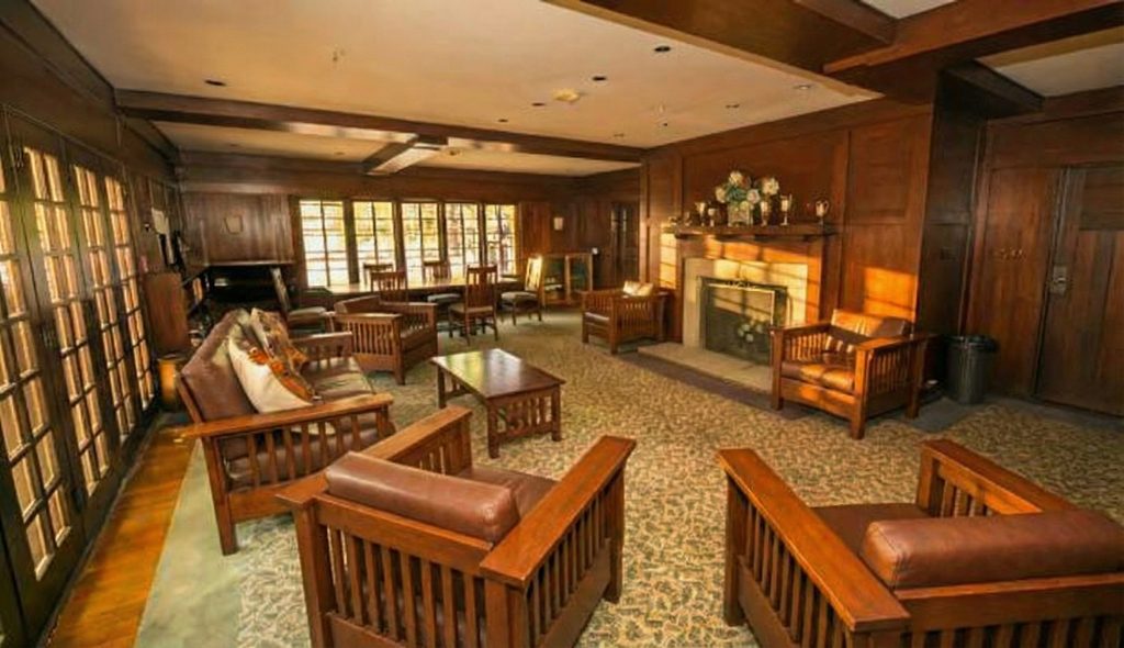 Interior living room of the Robert Pitcairn Jr. house displaying original woodwork, built-in cabinetry, and period furnishings.