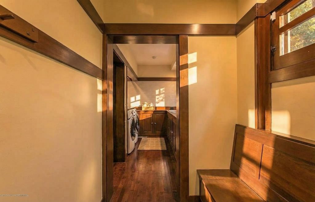 Mudroom at The Dr. William T. Bolton House #3 with built-in benches and practical storage solutions.