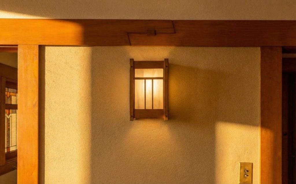 Detailed view of the second floor hallway at The Dr. William T. Bolton House #3 with wood paneling.