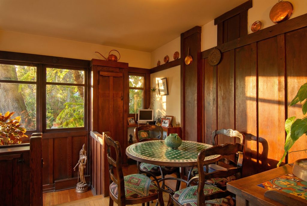 A comfortable sitting area in The Caroline S. de Forest House, with a mix of period and contemporary furnishings in a light-filled space.