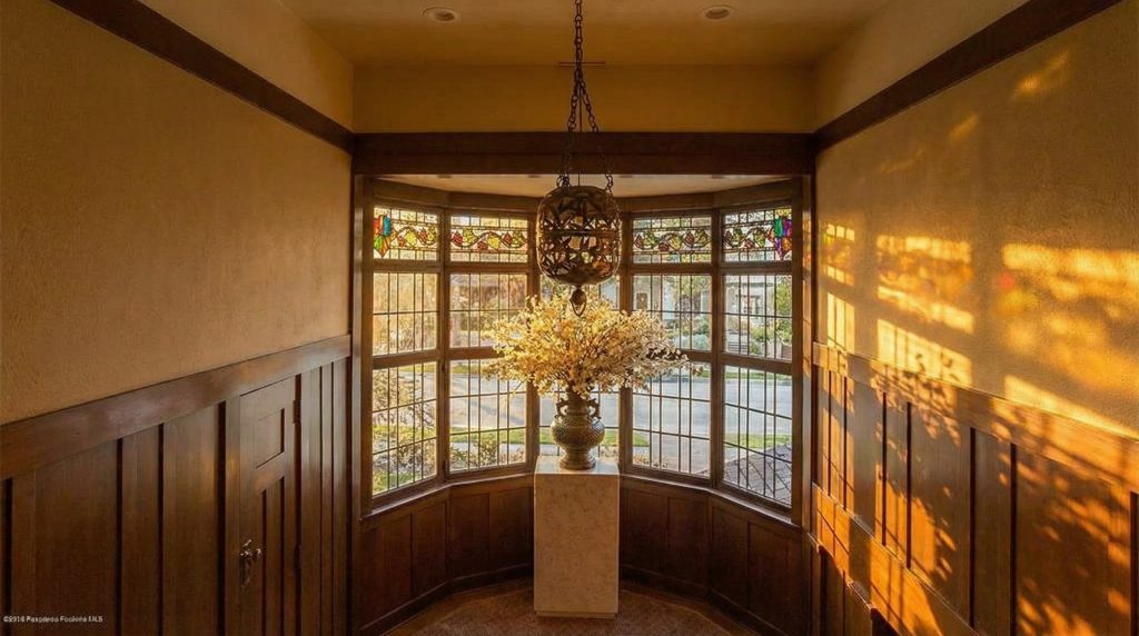 Stairwell at The Dr. William T. Bolton House #3 bathed in natural light from north-facing windows.