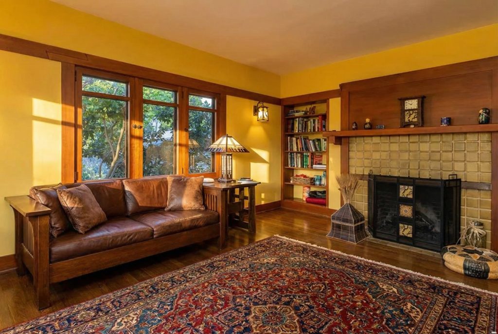 Wood-paneled study with built-in desk and window seat at The Margaret B. S. Clapham Spinks House.