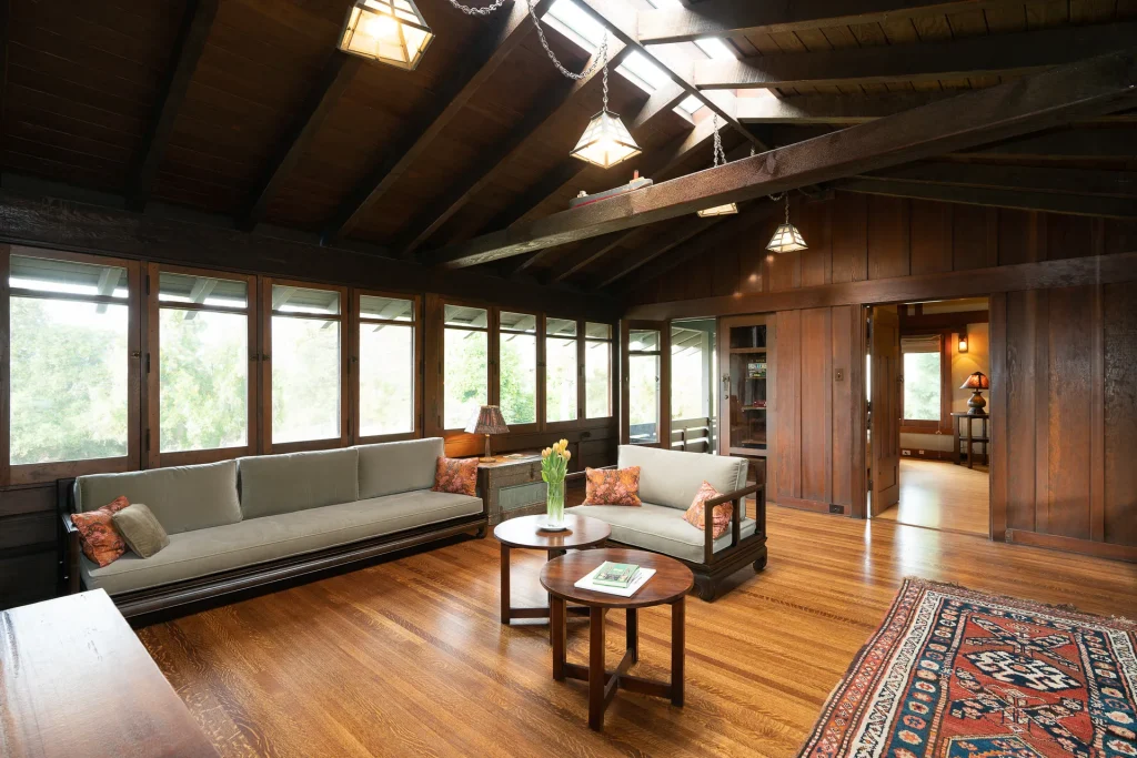 Alternate view of The Duncan-Irwin House upstairs living room showcasing craftsman architectural details.