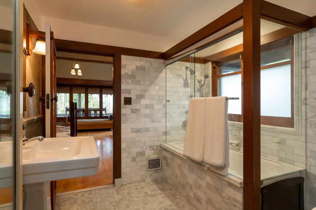 The Duncan-Irwin House master bathroom with original tile work and faithfully restored fixtures.