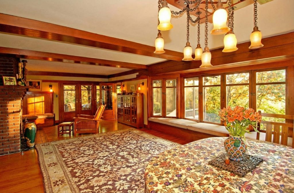 An alternate view from the dining area in The Caroline S. de Forest House, with a beautiful floral arrangement in the foreground.