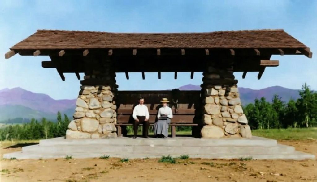 Historic colorized photograph of The Shelter for View Lovers pavilion with arroyo stone columns and shingled roof