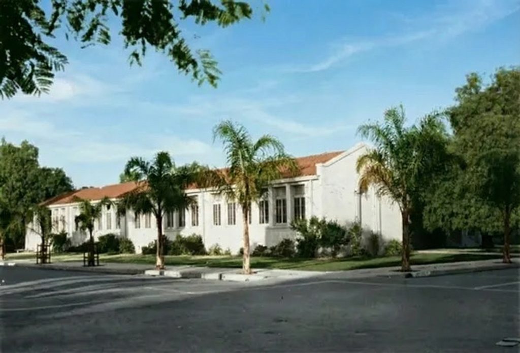 Historic 1930s photograph of George Washington School in Pasadena showing Spanish Colonial architecture with palm trees