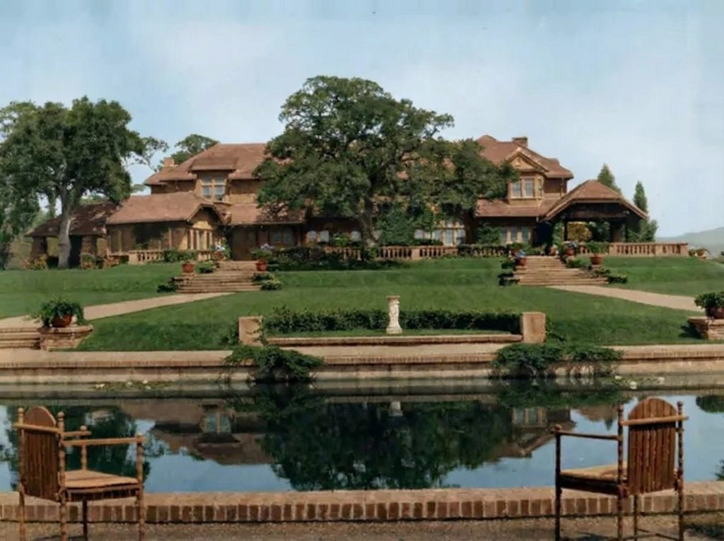 The rear south elevation of The Mortimer Fleishhacker Estate in 1915, with its shingle roof and newly planted terraced gardens.