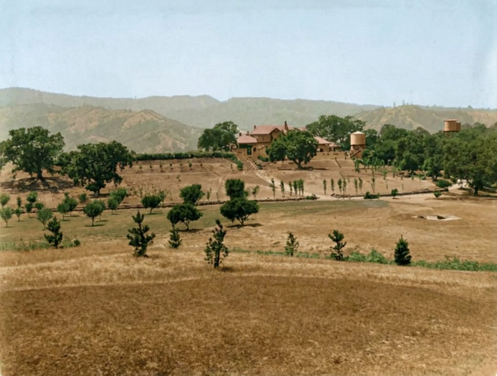 A distant 1915 photo of The Mortimer Fleishhacker Estate, showing the house set within the expansive Woodside landscape.