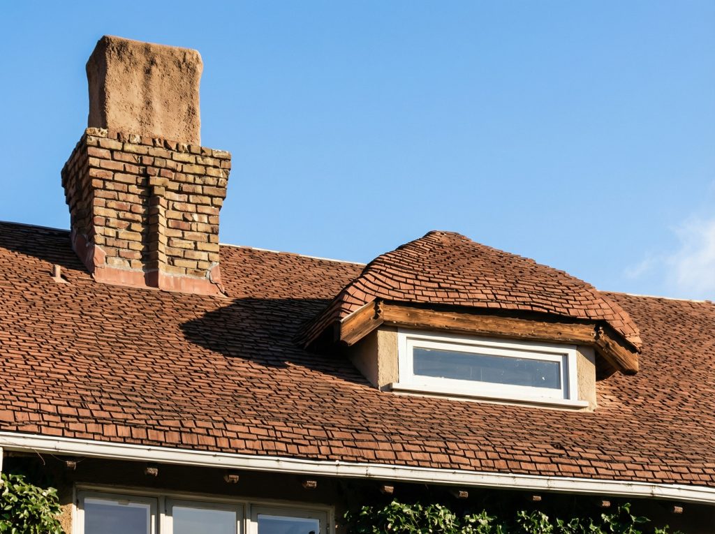 HABS survey detail of the chimney and a dormer on the east end of the west wing of The Mortimer Fleishhacker Estate.